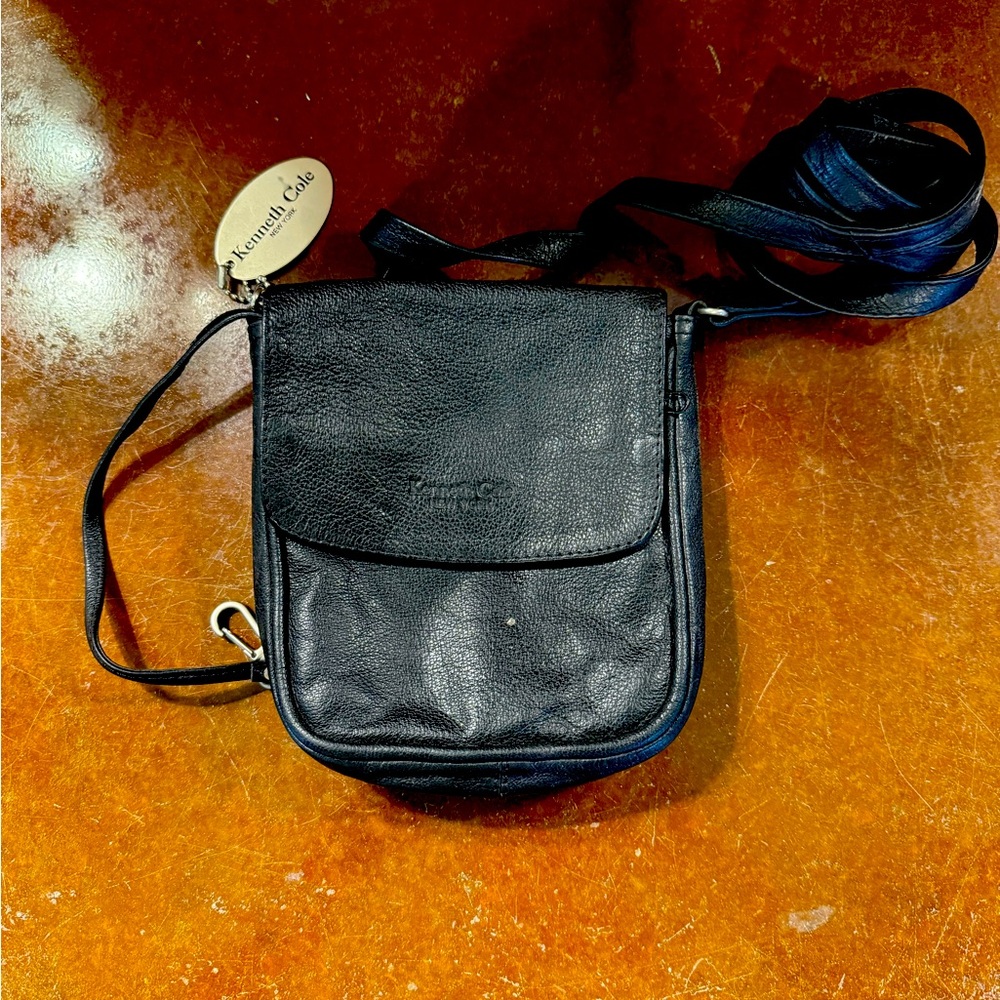 Kenneth Cole cross over